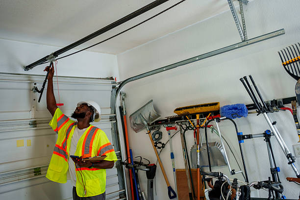 Professional Garage Door Panel Replacement technician working in Irvine, KY